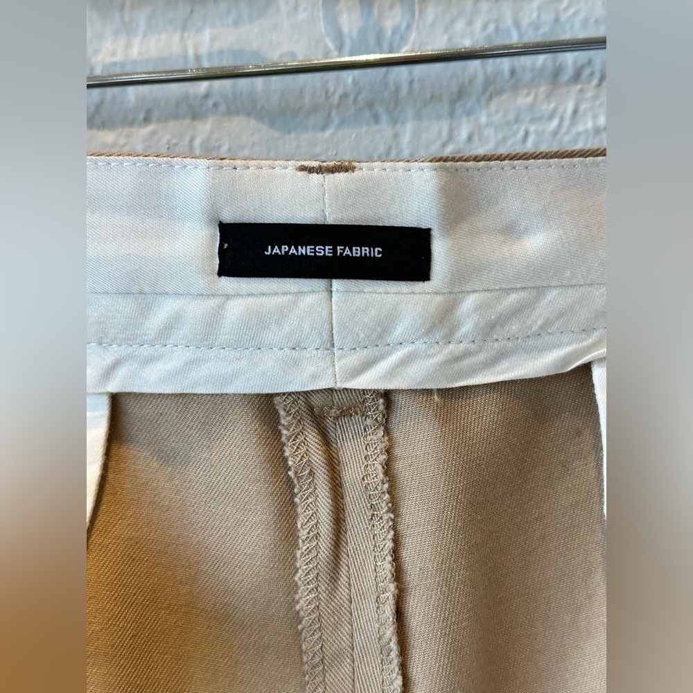 R13 Cropped Triple-pleat Crossover Trousers In Beige - Picture 13 of 16